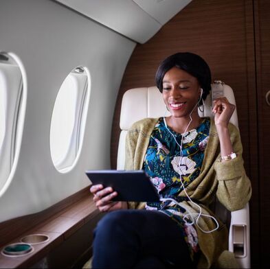 woman on private jet